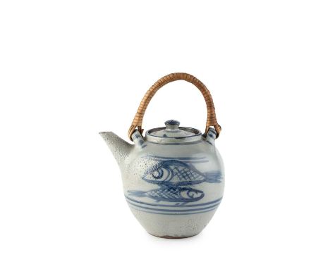 Michael Cardew (1901-1983) at Volta PotteryTeapotdecorated with brushwork fish in blue on a grey glaze, with cane handleimpre