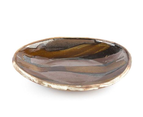 Michael Cardew (1901-1983) at Wenford BridgePlatterpoured glazesimpressed potter's and pottery seals37cm across. Provenance:B