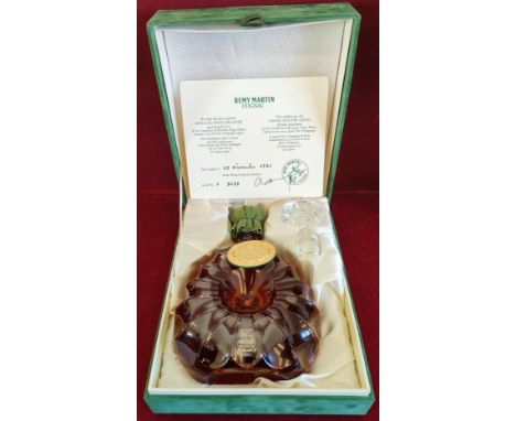 CASED REMY MARTIN CENTAURE CRISTAL COGNAC DECANTER, MADE SPECIALLY BY LES CRISTALLERIES DE BACCARAT, VOSGES, FRANCE. CONTAINS