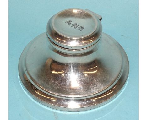 A small silver capstan inkwell, 5cm high, base 9.5cm diameter, hinged lid with initials, Chester 1916, maker J &amp; R Griffi