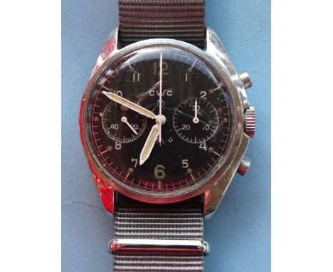 A CWC British military chronograph steel-cased wrist watch, the signed black dial with two inset subsidiary dials, circled 'T