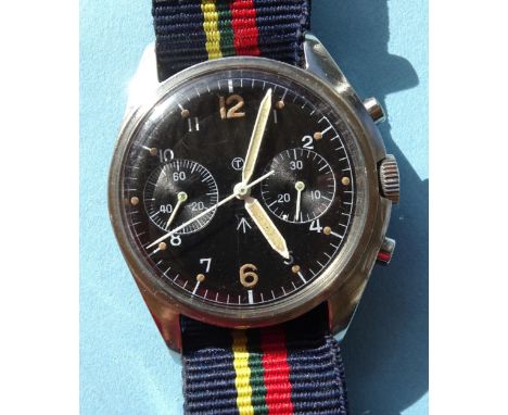 A CWC British military chronograph steel-cased wrist watch, the black dial with circled 'T', two inset subsidiary dials and b