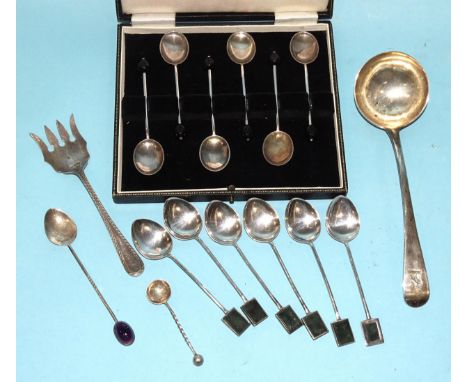 A George III small ladle, London 1805, by William Eley &amp; William Fearn, a cased set of six coffee spoons, six sterling si