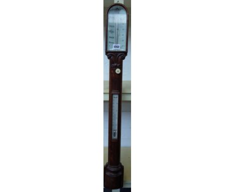 A late 19th century oak cased stick barometer by 'Callaghan London', the domed case over an ivory plate, thermometer and half