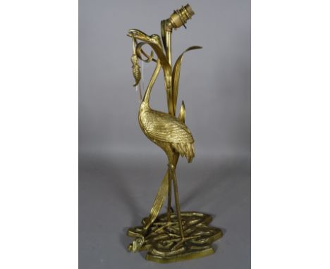 A 20th century brass figural lamp formed as a Heron, 60cm high. 