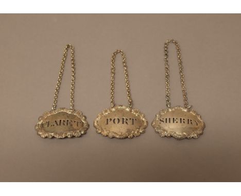 A silver decanter label, detailed CLARET, probably London 1814, an Irish silver decanter label detailed PORT, Dublin (the dat
