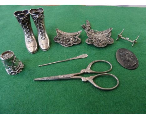 Two toothpick stands modelled as a pair of boots, detailed 925, a pair of scissors, a thimble, a needlework spike, a small st