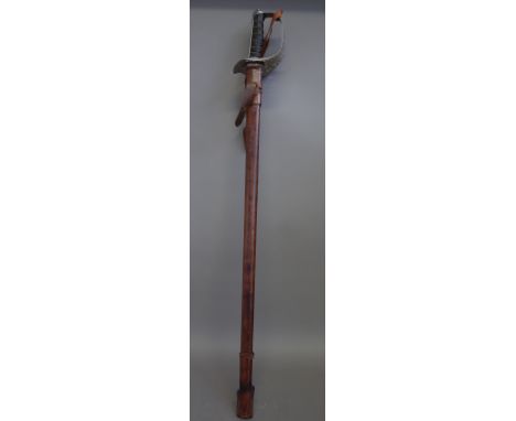 A George V officer's sword with straight polished engraved blade, 83cm, pierced hilt and wire bound leather grip in a leather