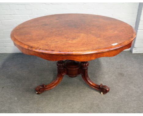 A Victorian figured walnut circular snap top centre table on carved tripod base, 121cm diameter x 73cm high. 