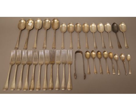 Silver rat tail pattern table flatware, comprising; five tablespoons, eleven table forks, nine dessert spoons and four teaspo