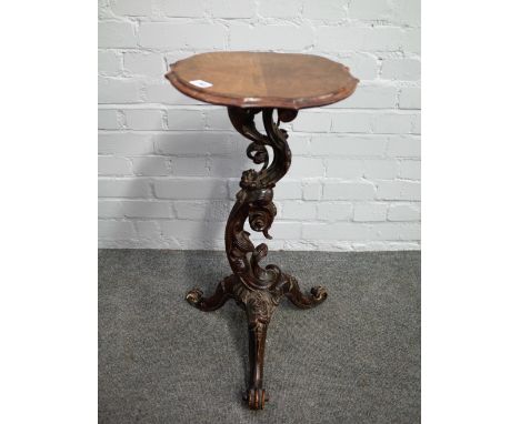 An Italian 18th century and later occasional table on floral scroll carved column and tripod base, 35cm wide x 70cm high.  