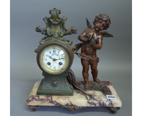 A French spelter and marble figural mantel clock, late 19th century, titled 'Enfant aux Cymbales', with foliate enamel dial a