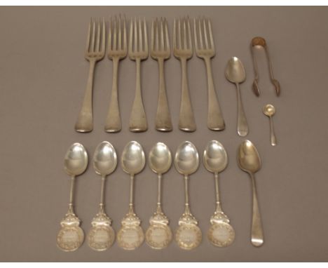 Silver flatware comprising six Old English pattern table forks, various dates, six Agricultural Society trophy spoons present