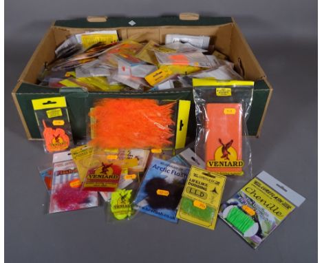 Fishing interest, including; fly tying tools and materials and fly hooks, mainly unused in packets, (qty). 