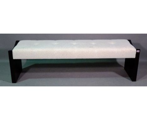 A 20th century hardwood framed rectangular footstool with white button upholstery, 159cm wide x 46cm high. 