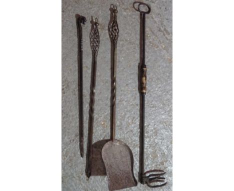 A group of four early 20th century copper fire tools, (4). 