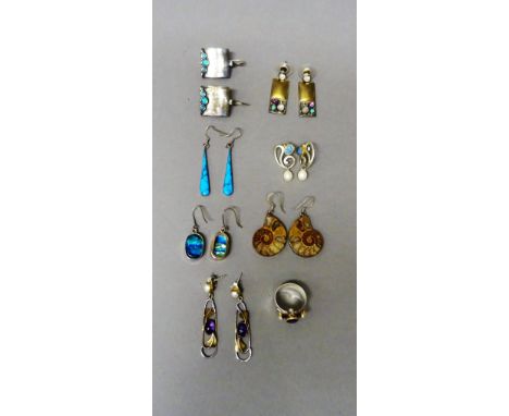 A pair of silver mounted amonite earrings, a pair of silver and gold mounted moonstone, amethyst and turquoise panel shaped e