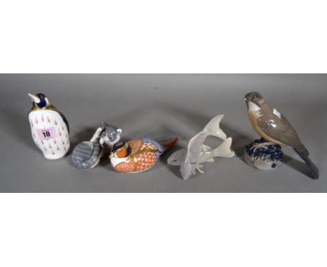 Ceramics, including; a Royal Crown Derby paperweight modelled as a penguin, a Copenhagen model of a cat, a blackbird and a bl