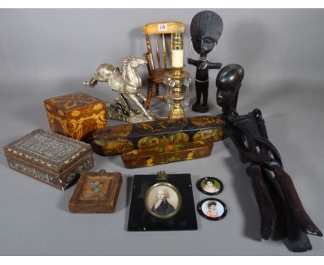 Collectables, comprising; a miniature open armchair, a group of three African hardwood figures, a Regency style table lamp wi
