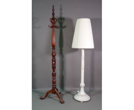 A Regency style mahogany hat stand on ball and claw feet, 208cm high and a 20th century white painted standard lamp on circul