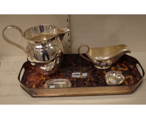 A group of plated wares, comprising, a shaped rectangular twin handled tray, with a simulated tortoiseshell lining, raised on