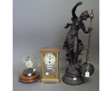 A French brass cased four glass mantel clock with faux mercury pendulum, 22.5cm high, an early 20th century timepiece with su