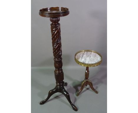 A 20th century carved mahogany torchere stand, 28cm wide x 117cm high and a marble top tripod table with brass galleried top,