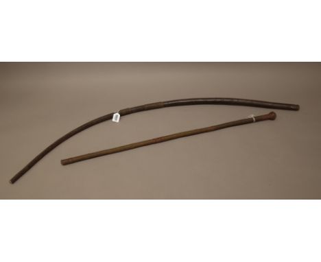 A South African leather whip, with wire banded decoration of naturalistic curved form (110cm) and another South African wire 