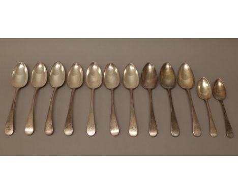 Silver Old English pattern table flatware, comprising; seven table spoons, Newcastle 1799, three table spoons, Newcastle 1800