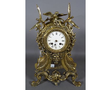 A Louis XV style gilt brass mantel clock, 40cm high. 