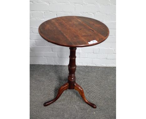 A mid-18th century oak circular snap top tripod occasional table, 45cm diameter x 70cm high. 