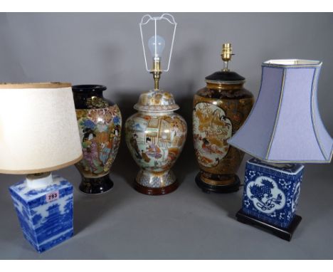 A 20th century Chinese baluster vase, decorated with butterflies, converted into a lamp, two blue and white rectangular lamps