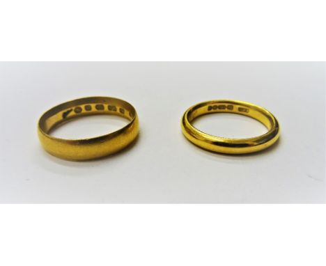 Two 22ct gold wedding rings, ring sizes K and N, combined weight 8.2 gms, (2).