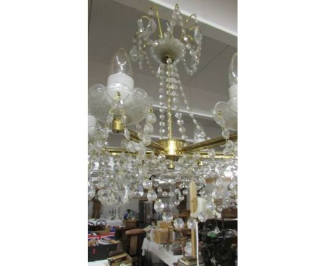 A good six lamp brass and glass chandelier.