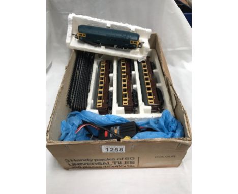 A Lima H0/00 gauge, great Western carriages, a diesel loco &amp; Hornby transformer