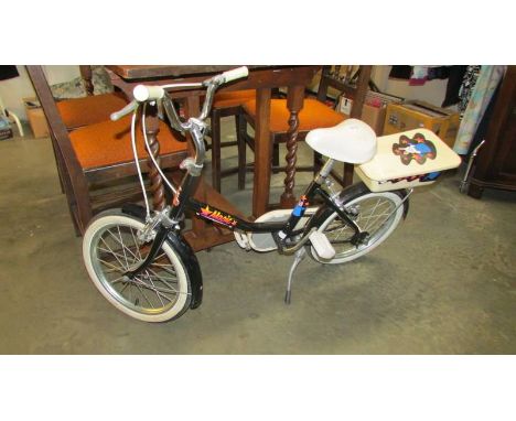 A vintage child's Raleigh Magic bicycle in very good condition.
