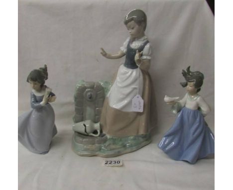 3 NAO figurines - A girl at a pump, a girl with a bird and a girl with flowers.