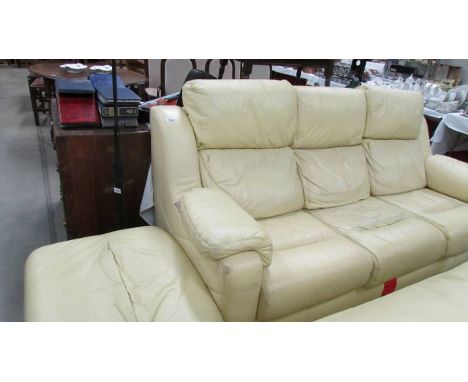A G plan cream leather three seat sofa with matching stool/storage box.