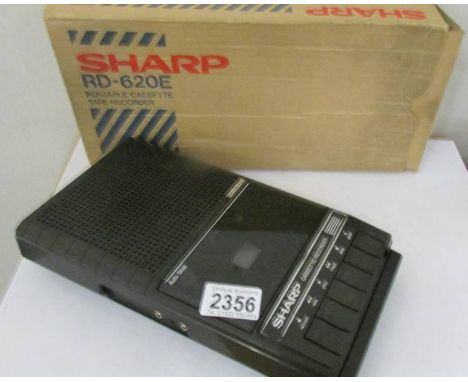 A boxed Sharp Rd. 620E Cassette recorder.