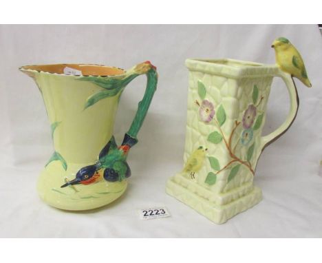 A Burleigh Ware kingfisher jug together with another bird decorated jug.