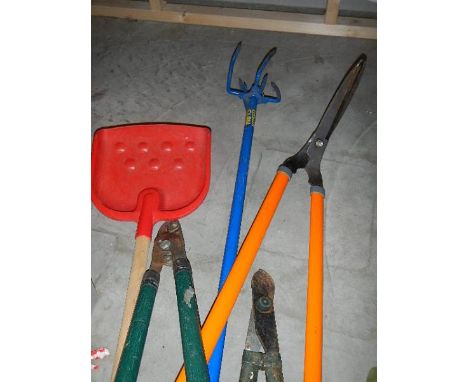 A quantity of garden tools.