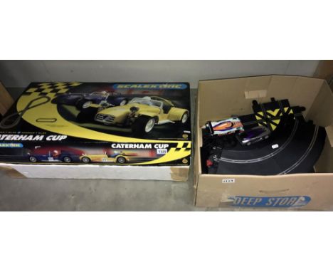 A Scalextric C1034, Caterham cup set (no cars) &amp; unboxed Hornby Hobbies track &amp; 2 cars