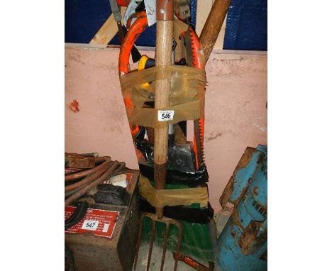 A quantity of garden tools.
