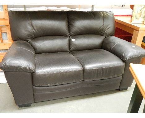 A black 2 seater leather sofa in good condition.