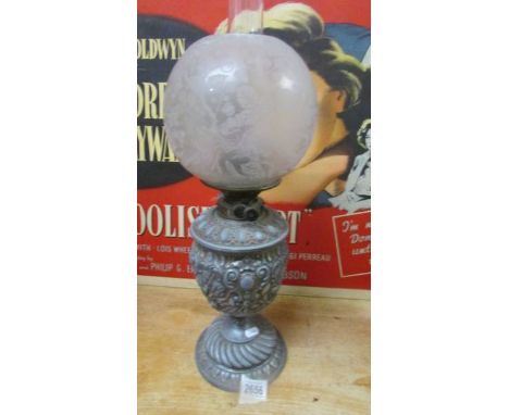 A decorative Victorian oil lamp with drop in glass font, original Duplex burner and original etched glass shade.