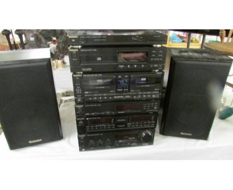 An as new Technics Separated hi fi system with boxes and accessories incorporating an SU-X933 amplifier, SH-E66 equaliser, ST