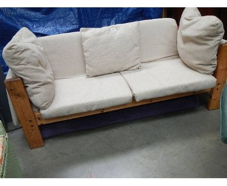 A pine framed sofa.