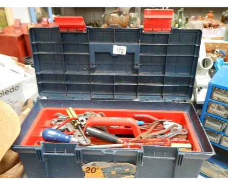 A tool box with assorted tools.