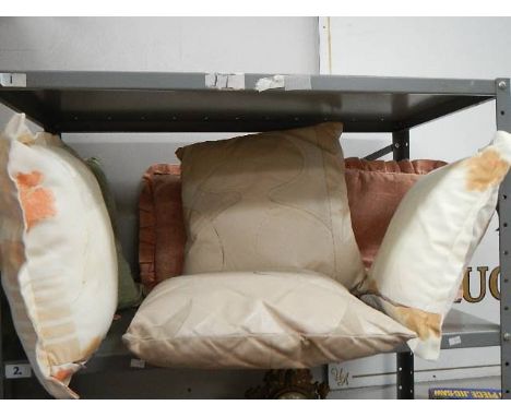 A Shelf of cushions.