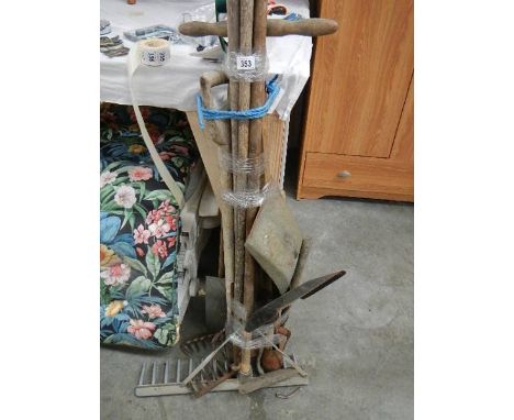 A quantity of garden tools.